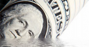 dollar bill sinking in water