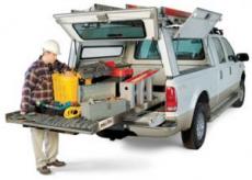 Boca Raton sprinkler installation & repair specialist grabbing parts from his truck